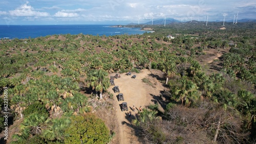 Billede på lærred Tourists on quad bikes near Punta Patilla beach sky view