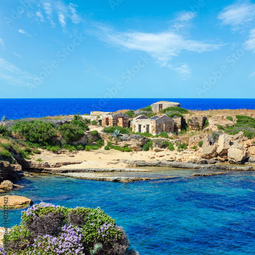 Spiaggia Massolivieri beach summer sea landscape and ruins (Siracusa, Sicily, Italy). 