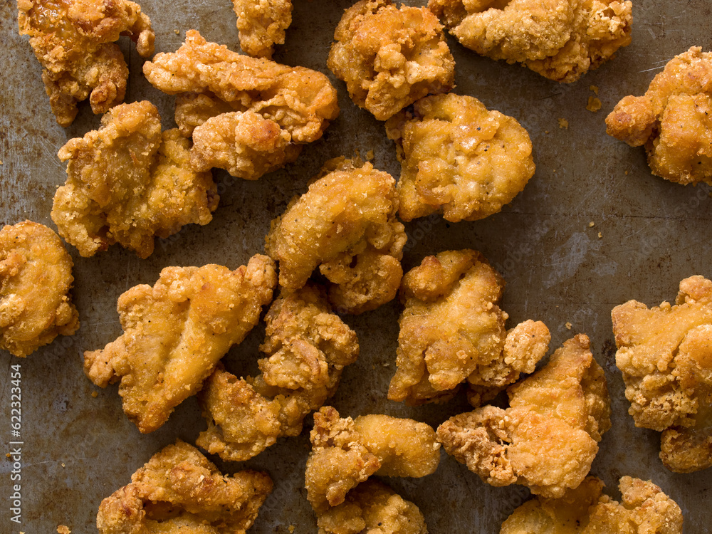 close up of rustic popcorn fried chicken nugget close up of rustic popcorn fried chicken nugget