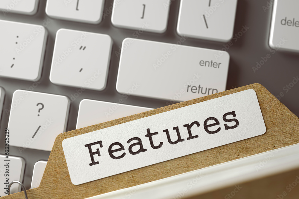 Features. Index Card Overlies White PC Keypad. Business Concept. Closeup View. Toned Blurred Illustration. 3D Rendering. Features. Index Card Overlies White PC Keypad. Business Concept. Closeup View. Toned Blurred Illustration. 3D Rendering.