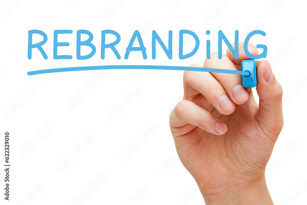Hand writing Rebranding with blue marker on transparent wipe board. Hand writing Rebranding with blue marker on transparent wipe board.