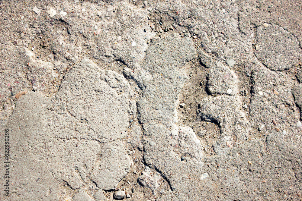 Old concrete road. Damaged concrete, dilapidated. Old concrete road. Damaged concrete, dilapidated.