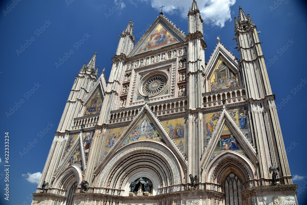 Orvieto in Italy and its wonderful white cathedral with some details of the front