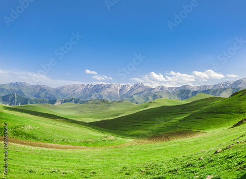 Beautiful landscape with green hills and magnificent cloudy sky. Exploring Armenia © Designpics