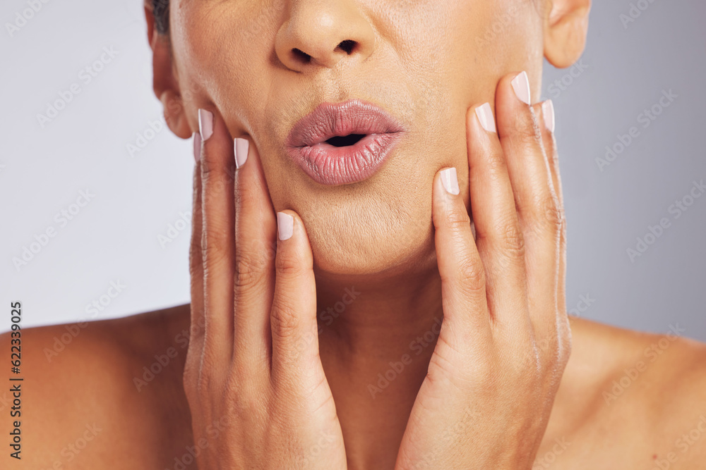 Lips, pouting or hands of a woman for skincare, beauty or dermatology wellness. Mouth, anti aging and face or manicure of a model for cosmetic nails, glow or wow isolated on a studio background Lips, pouting or hands of a woman for skincare, beauty or dermatology wellness. Mouth, anti aging and face or manicure of a model for cosmetic nails, glow or wow isolated on a studio background