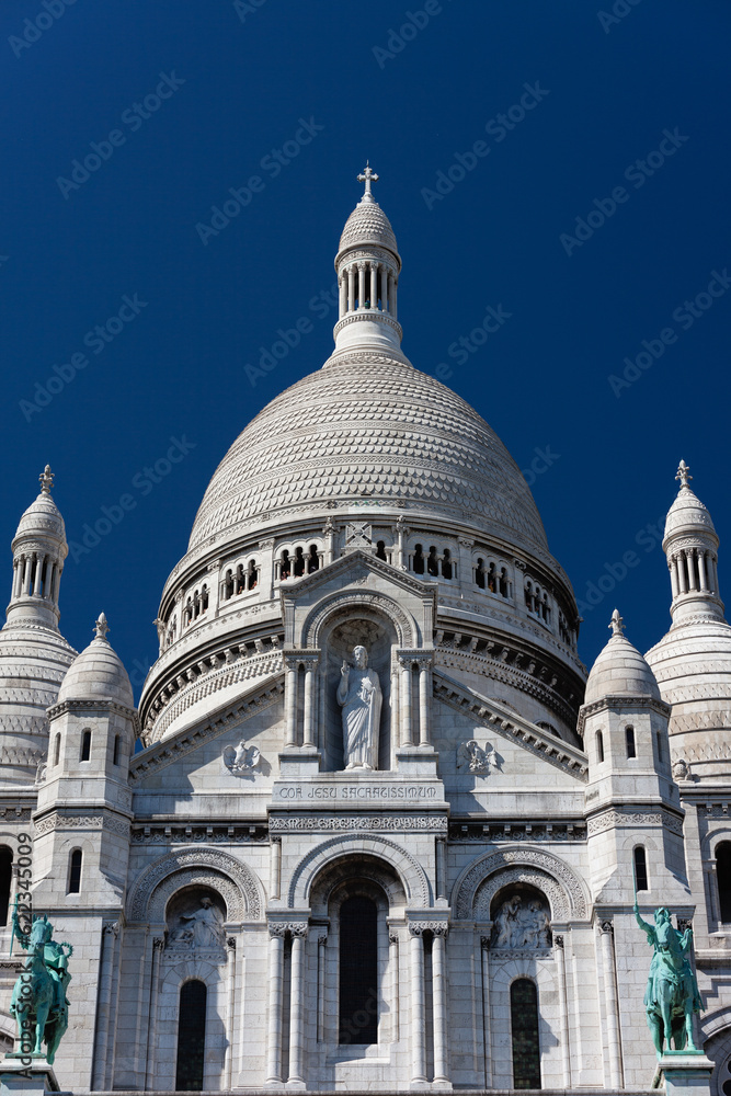 Basilica of the Sacred Heart built of travertine stone, the church is located at the summit of the butte Montmartre, the highest point in Paris, was designed by Paul Abadie