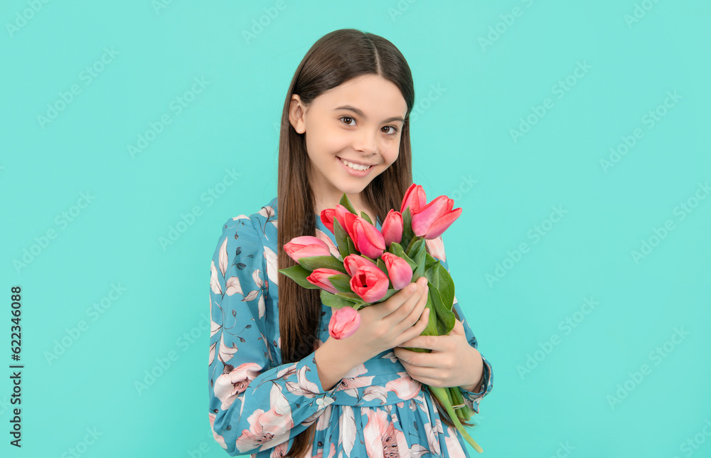 mothers or womens day. kid hold flowers for 8 of march. teen girl with spring bouquet mothers or womens day. kid hold flowers for 8 of march. teen girl with spring bouquet