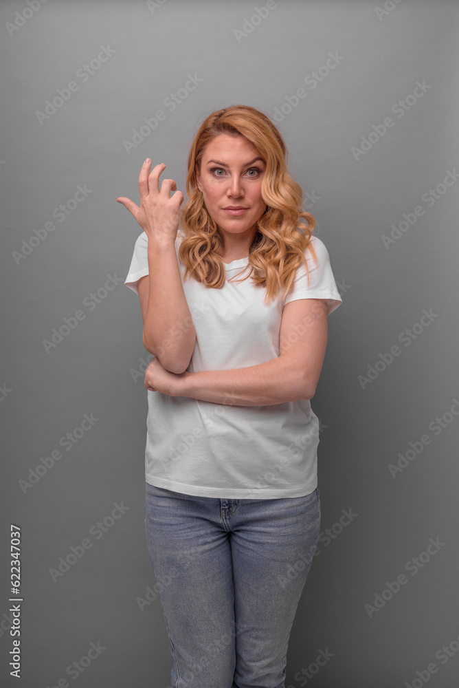 Asking girl on a gray background. Asking girl on a gray background.