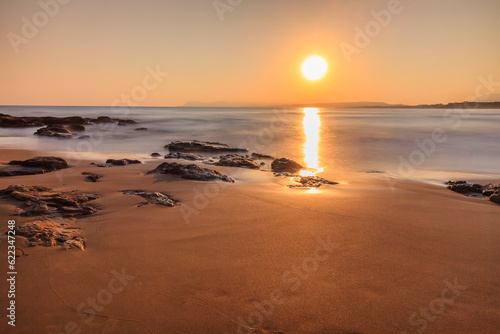 Fototapeta Naklejka Na Ścianę i Meble -  sunrise on the beach in Crete island, Greece