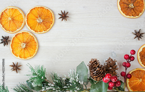 Christmas still life background with decorated fir branch and spices