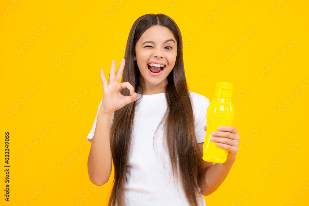 Girl teen hold water bottle. Water bottle and healthy life. Health and water balance. Drink and beverage concept. Girl teen hold water bottle. Water bottle and healthy life. Health and water balance. Drink and beverage concept.