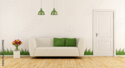 Freshly living room with modern sofa,closed door and grass decoration on wall - 3d rendering
