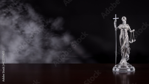 Bild auf Leinwand Lady Justice allegorical personification of the moral force in judicial systems on a dark background