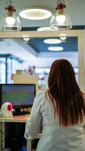 pharmacist woman working in the counter