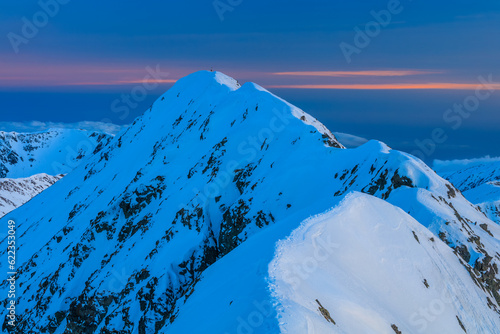 The Moldoveanu Peak in winter. Fagaras Mountains, Romania photo