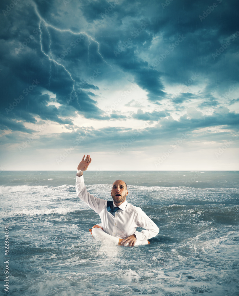 Businessman drowning in the sea and asks for help Businessman drowning in the sea and asks for help