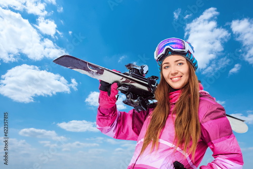 Attractive woman with skis