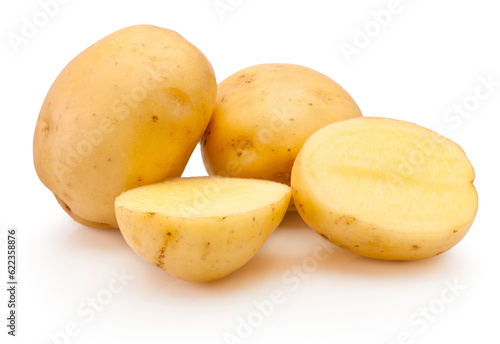 Raw potatoes freshly cut in half isolated on white background
