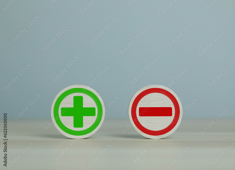 wooden blocks with plus and minus signs Comparatively opposite concepts ...