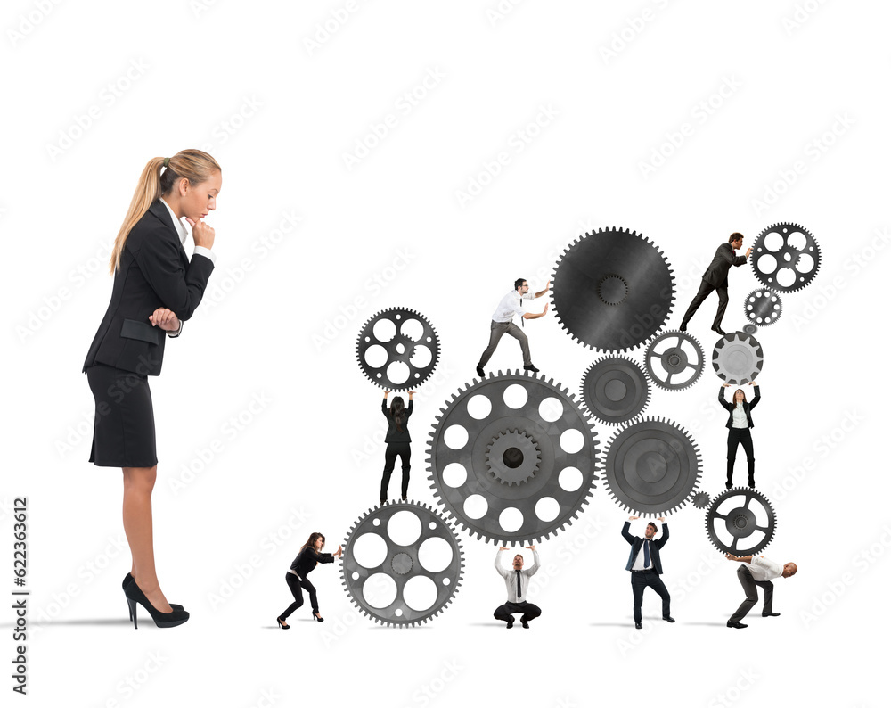 Φωτογραφία Businesswoman watches a teamwork of businesspeople work together to a system of