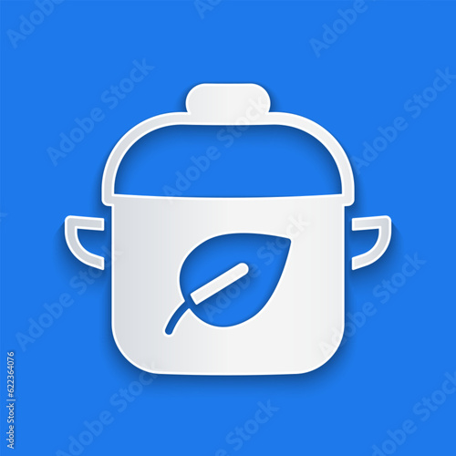 Paper cut Vegan food diet icon isolated on blue background. Organic, bio, eco symbol. Vegan, no meat, lactose free, healthy, fresh and nonviolent food. Paper art style. Vector