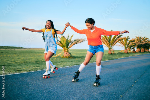 Roller skates, holding hands and friends on street for workout, exercise or training outdoor. Skating, happy people and girls together for sports on road to travel, journey and moving for fitness.