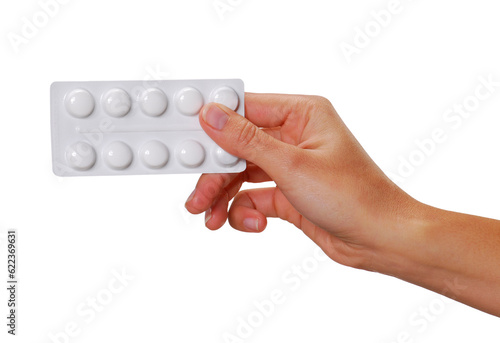 Female hand holding aspirin pills blister isolated on transparent layered background. photo