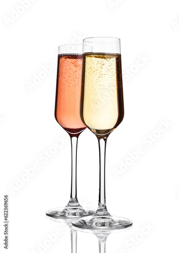 Glasses of pink  and yellow champagne on pink with bubbles on whitebackground
