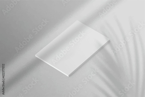 Realistic top view cover portrait A4 or A5 magazine or brochure booklet for stationery and branding. Mockup template isolated light background and leaf shadow overlay. 3D rendering vector.