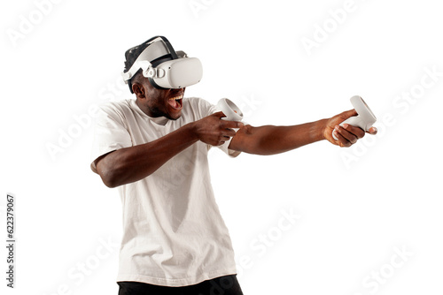 african american man in white t-shirt plays video games in virtual reality glasses and screams