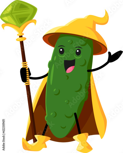 Cartoon cucumber Halloween vegetable wizard, witch and mage character. Vector ripe veggies magician personage with staff, wearing hat and cape promoting children entertainment related to magic or food