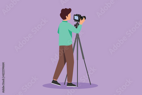 Character flat drawing back view of male photographer with camera on tripod. Studio photo. Professional photographer taking pictures, images. Photography icon, logo. Cartoon design vector illustration