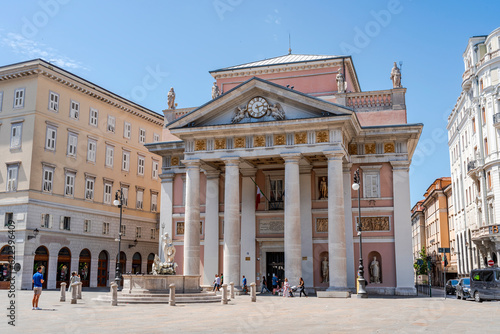 "Piazza della Borsa" square with the old Stock Exchange ("Borsa Vecchia") built in 19th century in neoclassical style, Trieste, Italy