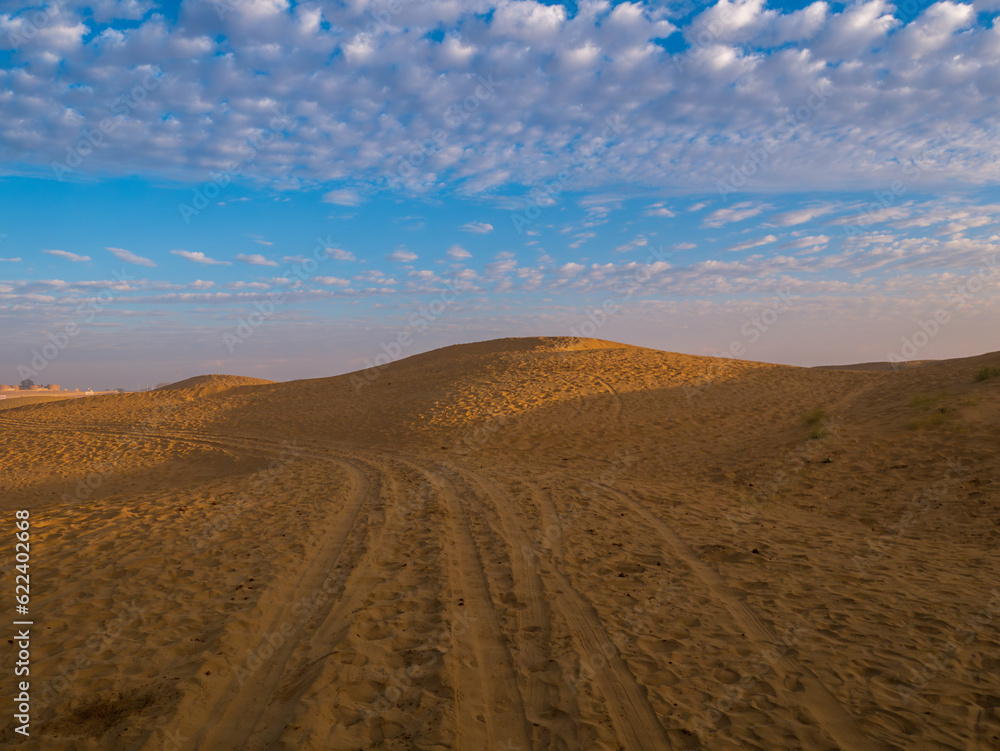 Beautiful sand dunes at sunset. Dramatic sky with Sand Dunes at Rajasthan