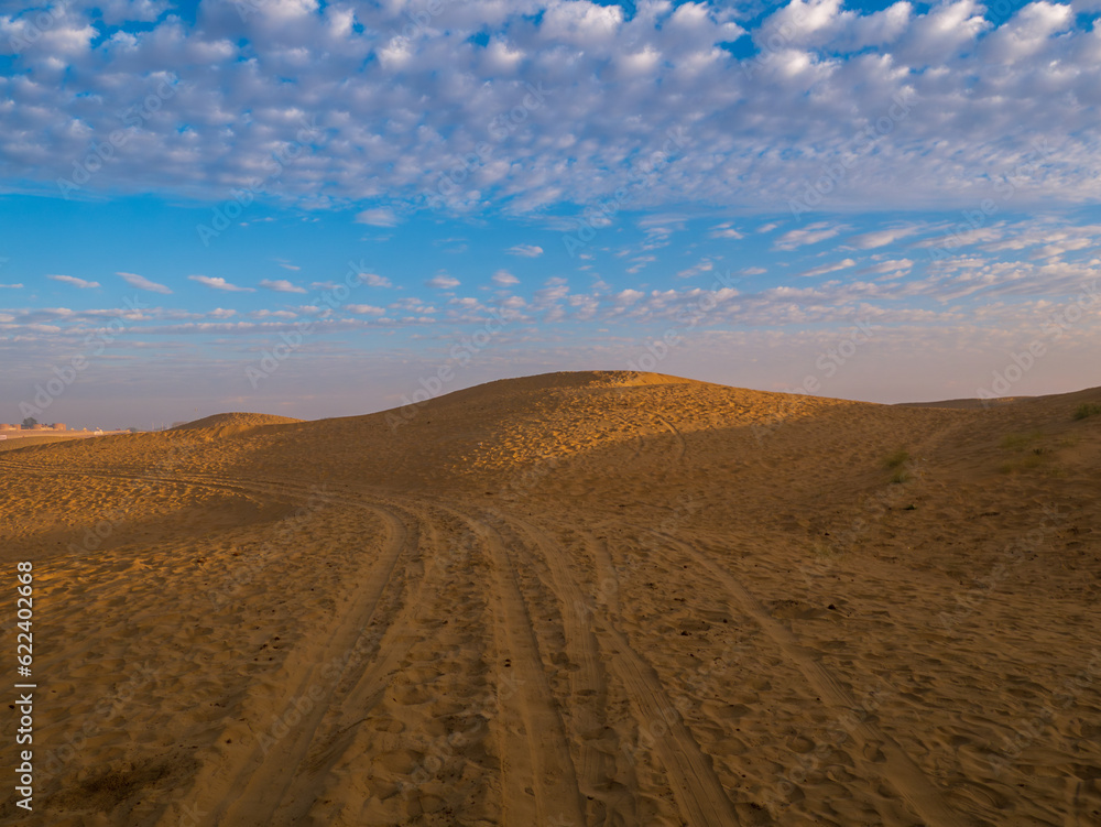 Beautiful sand dunes at sunset. Dramatic sky with Sand Dunes at Rajasthan Beautiful sand dunes at sunset. Dramatic sky with Sand Dunes at Rajasthan