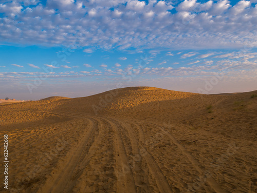 Beautiful sand dunes at sunset. Dramatic sky with Sand Dunes at Rajasthan