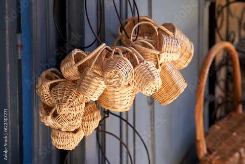 Small traditional souvenir wicker baskets on sale in Nice, France