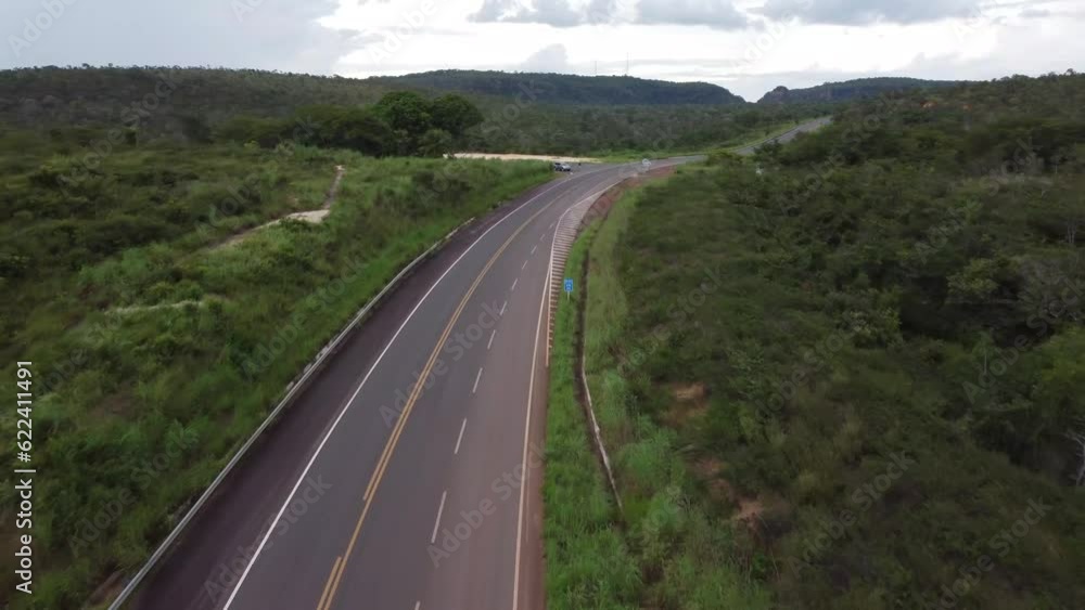Top view of car passing on road Top view of car passing on road