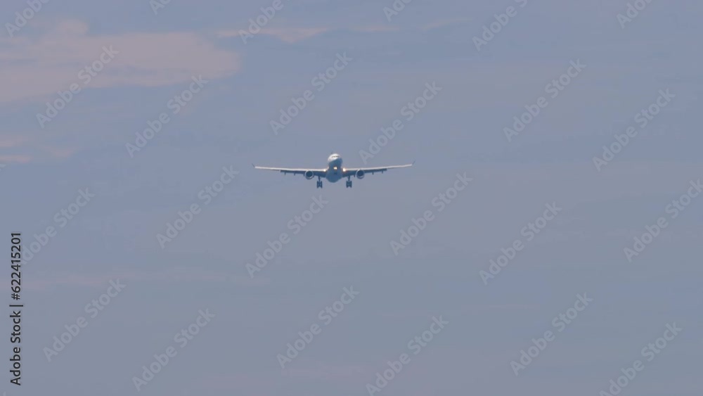 Jet aircraft approaching before landing. Airplane flies. Background of airplane in sky. Aviation concept Jet aircraft approaching before landing. Airplane flies. Background of airplane in sky. Aviation concept