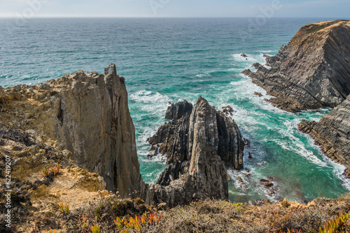 Cliff and rocks next to Sardão Cape in Vicentine Coast Natural Park, Odemira PORTUGAL photo