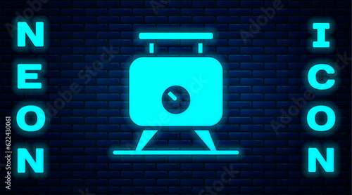 Glowing neon Metal tank with grape juice as alcoholic fermentation icon isolated on brick wall background. Vector