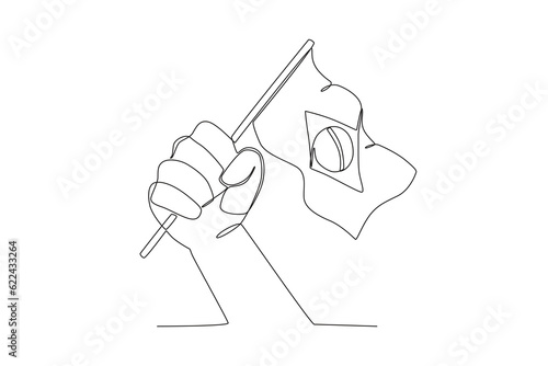 A hand holding a small Brazilian flag. 7 de setembro one-line drawing