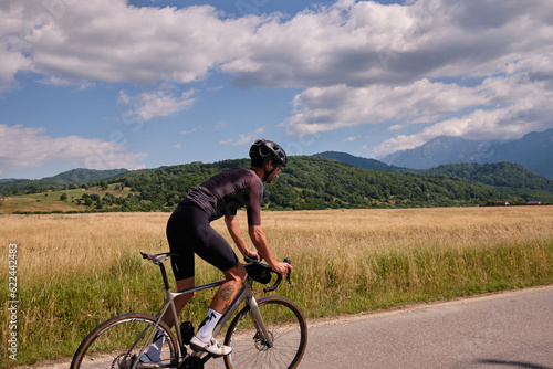 Cyclist riding on road bike in mountain.Training for competition.Sport motivation.Cyclist training on road bike.