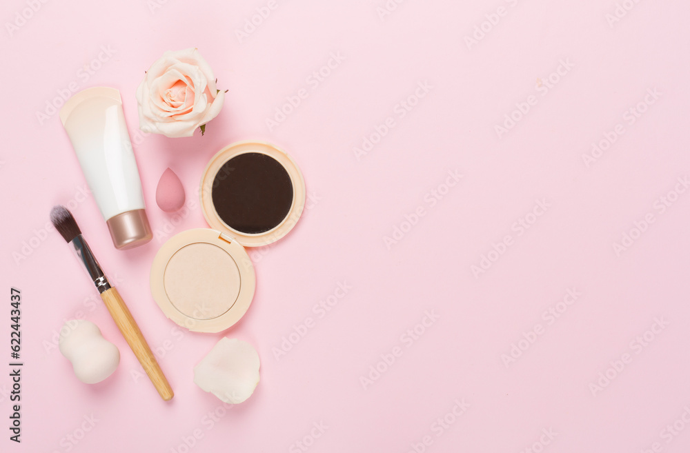 Composition with makeup products for skin tone on color background, top view Composition with makeup products for skin tone on color background, top view