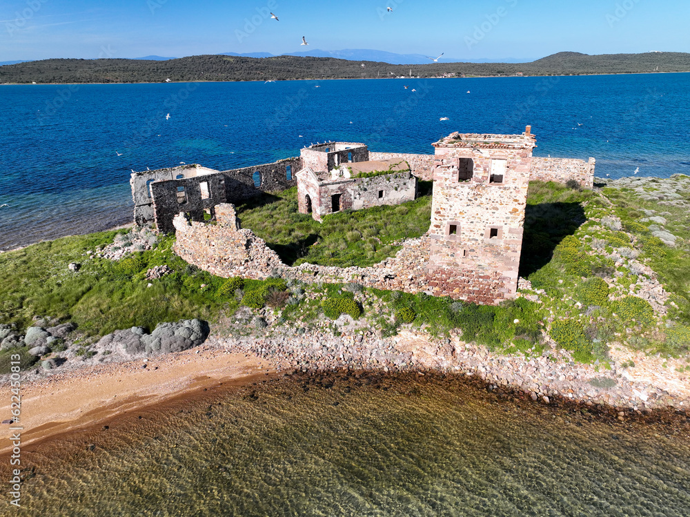 Historic ancient monastery on an island around the Patrica beach. Shooting with drone. (Turkish name; kizlar manastiri) Cunda - Ayvalik - Turkey