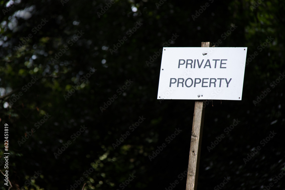 private property sign in woodland