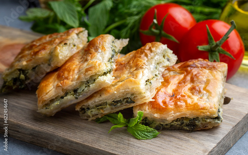 Greek cuisine; Spinach Tart or Spinach Pie. Turkish name; ispanakli borek or ispanakli tart photo