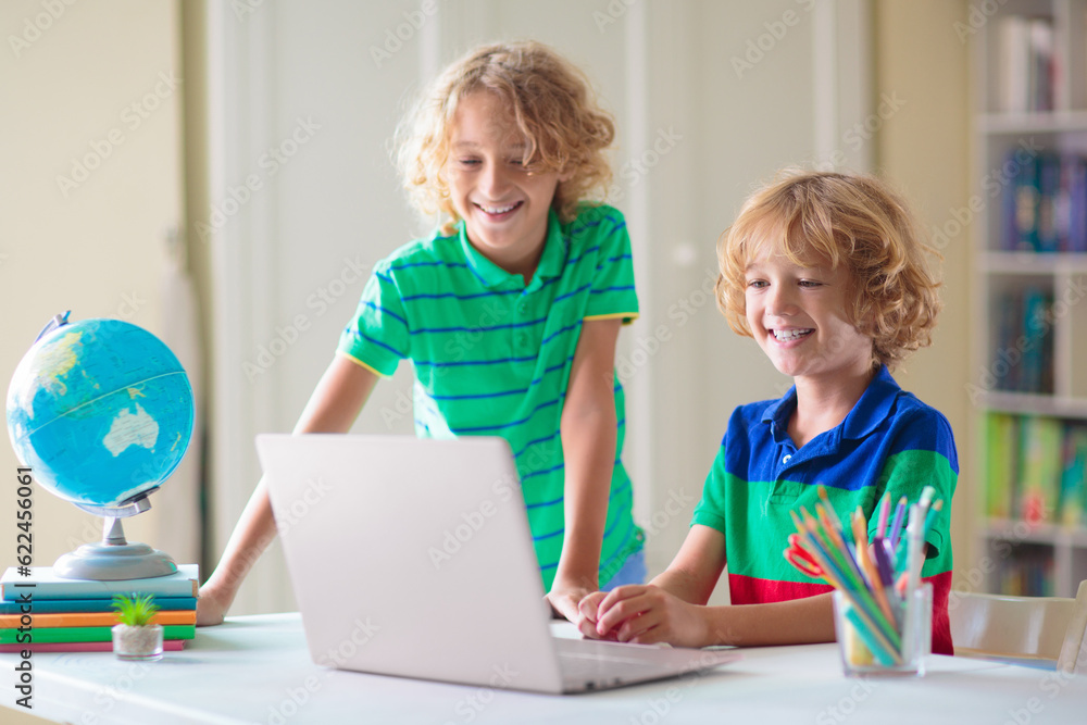 Online remote learning. School kids with computer. Online remote learning. School kids with computer.