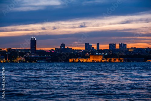 Illuminated architecture Dolmabahce Palace. Night view of istanbul city and skyscrapers. Awesome Panoramic view of Istanbul Bosphorus on night.