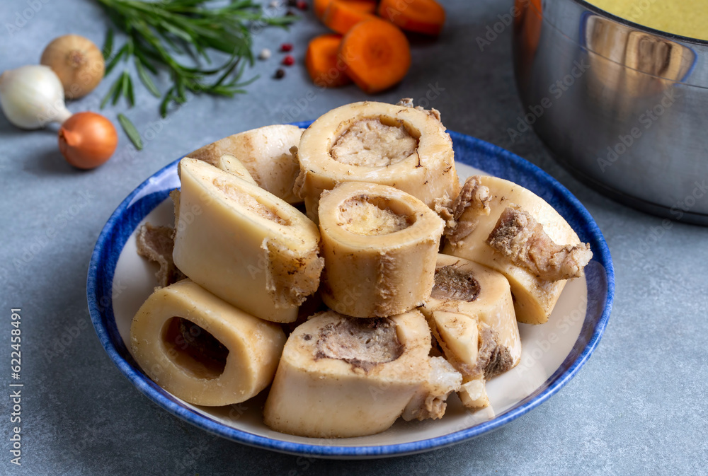 Boiled bone and broth. Homemade beef bone broth is cooked in a pot on. Bones contain collagen, which provides the body with amino acids, which are the building blocks of proteins. Boiled bone and broth. Homemade beef bone broth is cooked in a pot on. Bones contain collagen, which provides the body with amino acids, which are the building blocks of proteins.